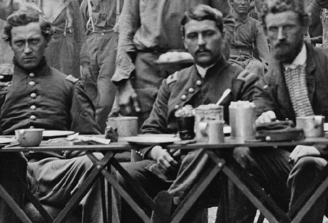 Here are Officers of Co. F, 93rd New York Infantry having dinner at Bealton, Virginia. Again notice the size and shapes of their cups. 
