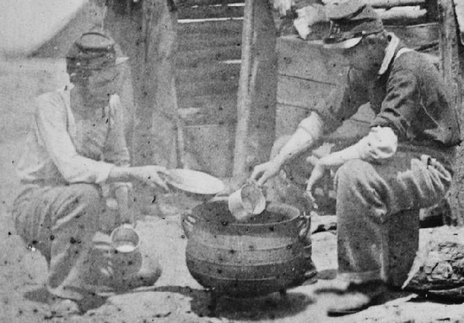 Soldiers of the 71st New York Volunteer Infantry Preparing their meal, [Soup or Stew ?] in a large kettle. Notice the cup one soldier uses as a dipper. It appears to be about 4 inches diameter, but is definitely much shorter than the "standard" cup.