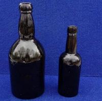 Fine Civil War Period "Baby" or Salesman's Black Glass Whiskey Bottle