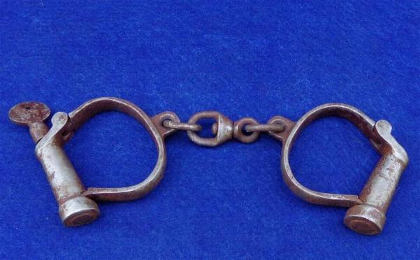 Fine Pair of Early Hiatt Marked Handcuffs with Key