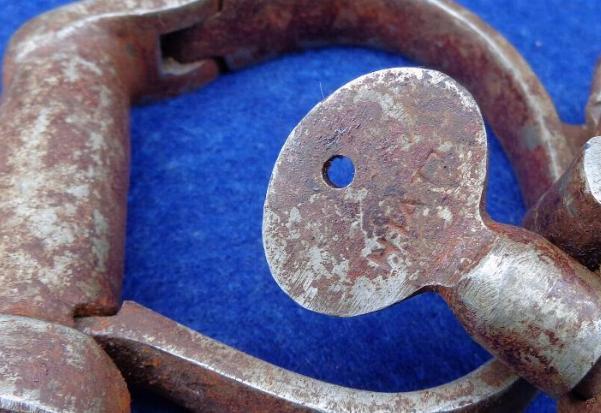 Fine Pair of Early Hiatt Marked Handcuffs with Key