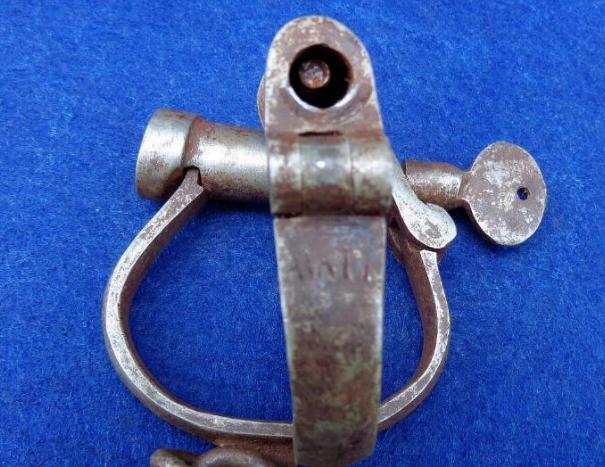 Fine Pair of Early Hiatt Marked Handcuffs with Key