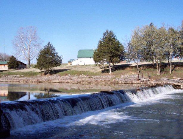 What remains of the old mill dam, in War Eagle River. It still provides water to power the Grist Mill today ! 