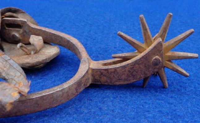 Huge Western Pattern Iron Spur, w/eagle button on the strap, and similar to Spur W5 in Howard Crouches' book, Historic American Spurs. 