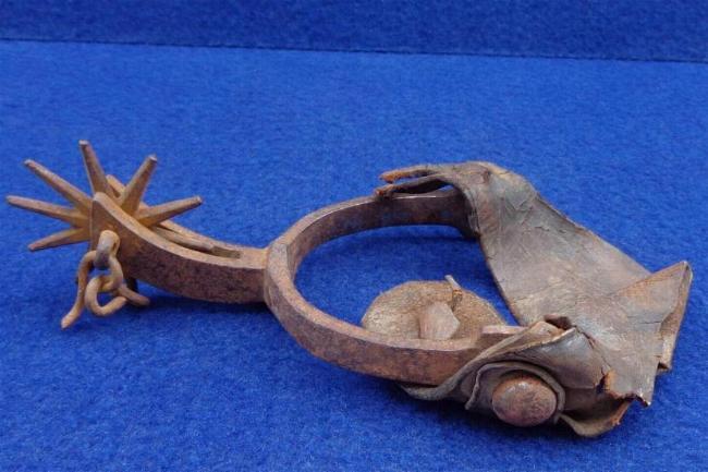 Huge Western Pattern Iron Spur, w/eagle button on the strap, and similar to Spur W5 in Howard Crouches' book, Historic American Spurs. 