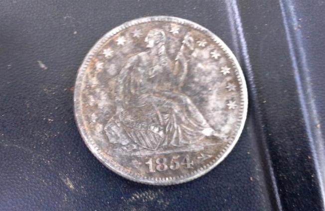 Nice bunch of relics recovered by Doug Dorothy, including an 1854 Seated Liberty Half Dollar.