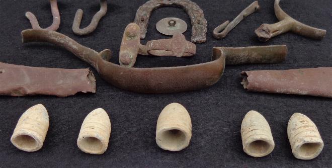 Nice Group of Relics Including knapsack hooks, iron heel plate, spur portion, trigger guard, bullets, etc. All recovered near the Prairie Grove, Arkansas, Battlefield. 