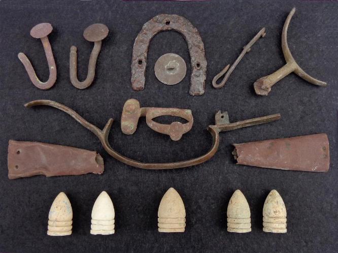 Nice Group of Relics Including knapsack hooks, iron heel plate, spur portion, trigger guard, bullets, etc. All recovered near the Prairie Grove, Arkansas, Battlefield. 